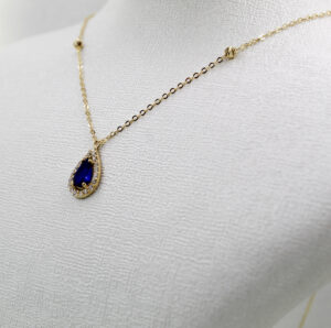 سلسال ذهبي بحجر أزرق